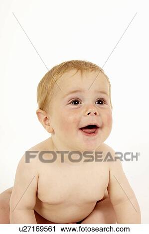 Toddler boy crawling on floor View Large Photo Image Stock Image - Toddler boy crawling on floor. Fotosearch