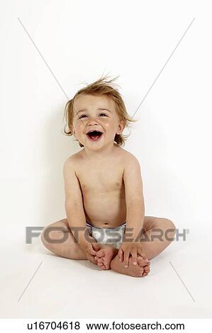 Toddler boy wearing diaper View Large Photo Image Stock Photo - Toddler boy wearing diaper. Fotosearch