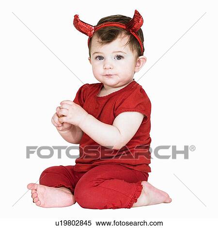 Stock Photography - Toddler girl wearing devil costume. Fotosearch