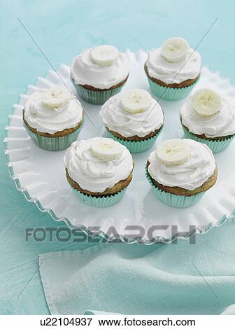 Tray of banana cupcakes View Large Photo Image Stock Photo - Tray of banana cupcakes. Fotosearch