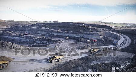 Stock Photo - Trucks at surface coal mine site. Fotosearch