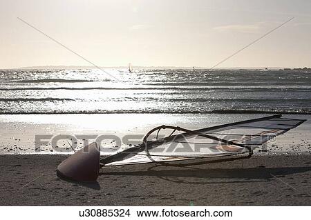 Picture - Wind sailing board on beach. Fotosearch
