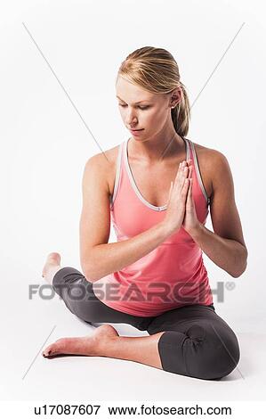 Woman practicing yoga View Large Photo Image Stock Photo - Woman practicing yoga. Fotosearch