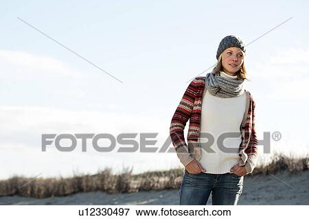 Woman walking on beach View Large Photo Image Stock Photo - Woman walking on beach. Fotosearch