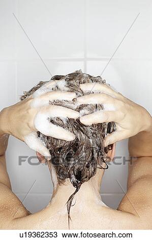 Woman washing her hair in shower View Large Photo Image Stock Image - Woman washing her hair in shower. Fotosearch