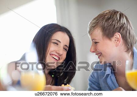 Women eating breakfast together View Large Photo Image Stock Photograph - Women eating breakfast together. Fotosearch