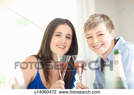 Women having champagne together View Large Photo Image Stock Image - Women having champagne together. Fotosearch