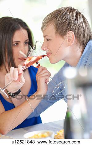 Stock Photo - Women having champagne together. Fotosearch