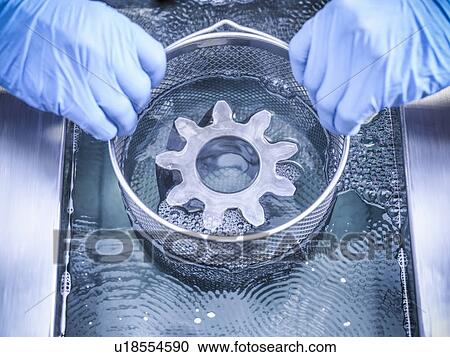 Worker cleaning with ultrasonics View Large Photo Image Stock Image - Worker cleaning with ultrasonics. Fotosearch