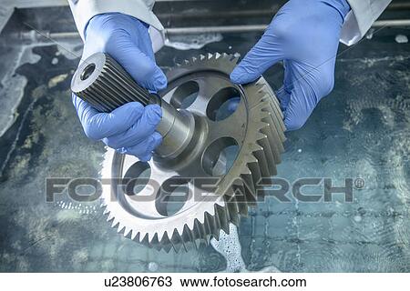 Worker cleaning with ultrasonics View Large Photo Image Stock Image - Worker cleaning with ultrasonics. Fotosearch