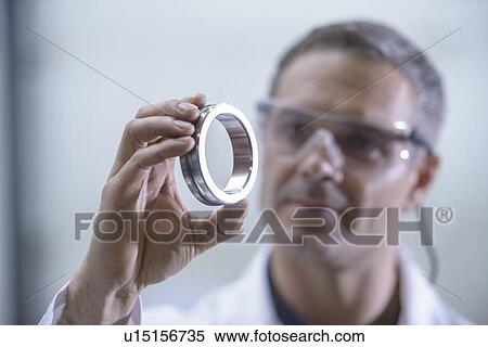 Worker cleaning with ultrasonics View Large Photo Image Stock Photography - Worker cleaning with ultrasonics. Fotosearch