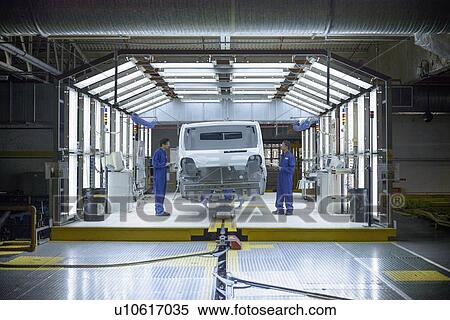 Workers inspecting car in factory View Large Photo Image Stock Photography - Workers inspecting car in factory. Fotosearch