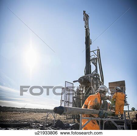 Workers on drilling rig at coal mine View Large Photo Image Stock Photograph - Workers on drilling rig at coal mine. Fotosearch