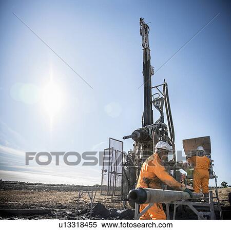 Stock Photography - Workers on drilling rig at coal mine. Fotosearch