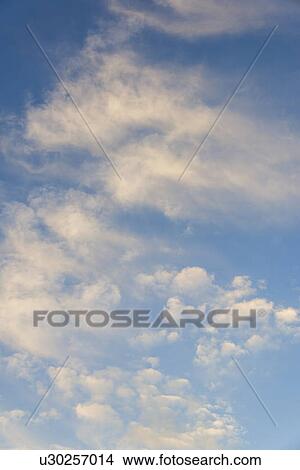 Blue sky with clouds View Large Photo Image Picture - Blue sky with clouds. Fotosearch
