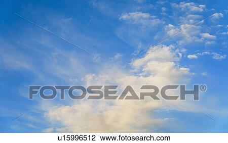 Blue sky with clouds View Large Photo Image Stock Image - Blue sky with clouds. Fotosearch
