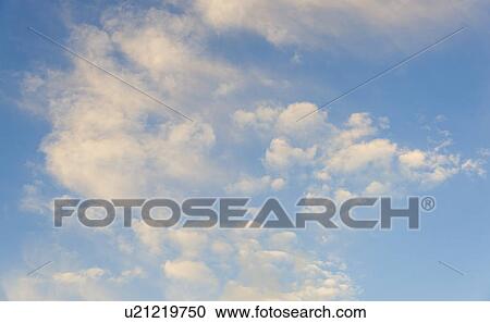 Stock Image - Blue sky with clouds. Fotosearch