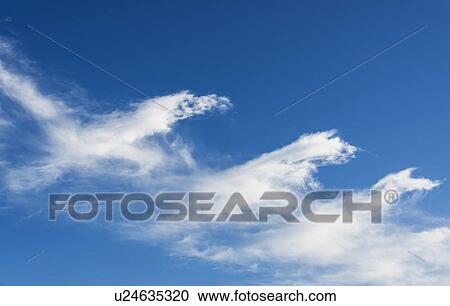 Stock Image - Blue sky with clouds. Fotosearch