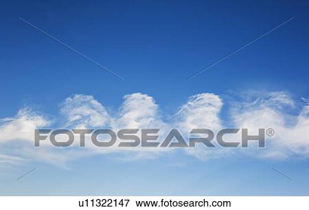 Blue sky with clouds View Large Photo Image Stock Photo - Blue sky with clouds. Fotosearch