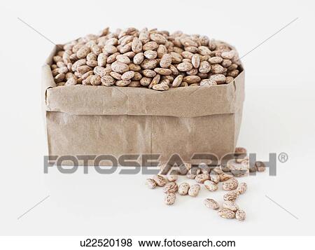 Carton of beans on white background View Large Photo Image Stock Photo - Carton of beans on white background. Fotosearch