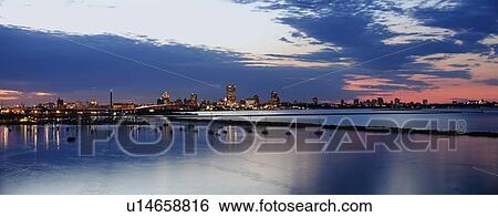 City skyline at dusk View Large Photo Image Stock Photograph - City skyline at dusk. Fotosearch