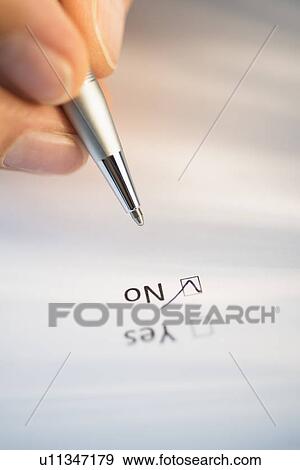 Close-up of hand filling out form View Large Photo Image Stock Photo - Close-up of hand filling out form. Fotosearch