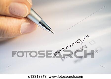 Close-up of hand filling out form View Large Photo Image Stock Photo - Close-up of hand filling out form. Fotosearch