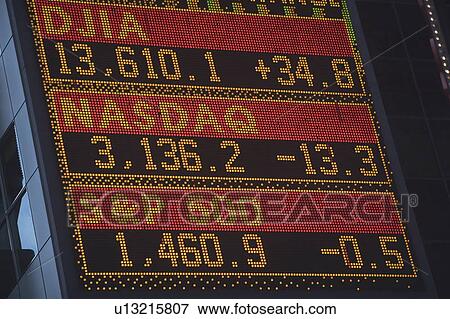 Stock Photo - Close up of trading board at stock exchange. Fotosearch
