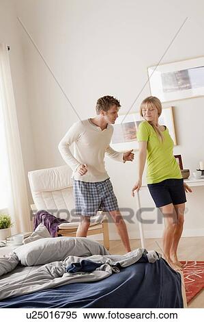 Couple dancing in bedroom View Large Photo Image Stock Photography - Couple dancing in bedroom. Fotosearch