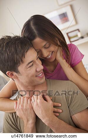 Stock Photo - Couple embracing. Fotosearch