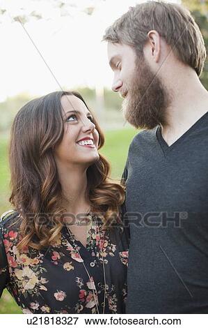 Couple looking in eyes View Large Photo Image Stock Photo - Couple looking in eyes. Fotosearch