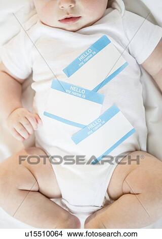 Picture - Identity labels belly of baby boy (2-5 months). Fotosearch