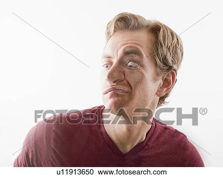 Man pushing his face against glass View Large Photo Image Stock Image - Man pushing his face against glass. Fotosearch