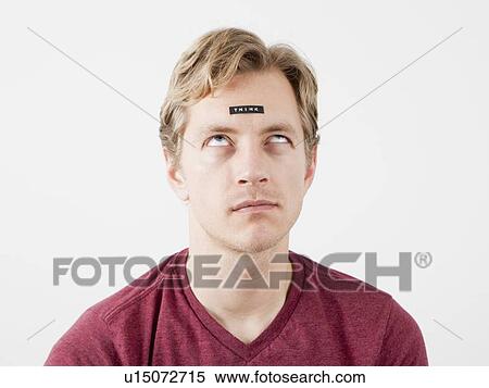 Man with sticker on his forehead View Large Photo Image Stock Photography - Man with sticker on his forehead. Fotosearch