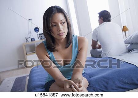 Mid adult couple after quarrel View Large Photo Image Stock Photo - Mid adult couple after quarrel. Fotosearch