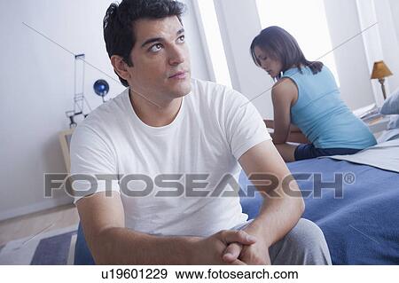 Mid adult couple after quarrel View Large Photo Image Stock Photo - Mid adult couple after quarrel. Fotosearch