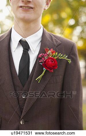 Mid section of groom wearing full suit decorated with boutonniere View Large Photo Image Stock Image - Mid section of groom wearing full suit decorated with boutonniere. Fotosearch