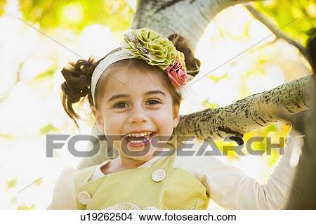 Outdoor portrait of smiling girl (4-5) View Large Photo Image Picture - Outdoor portrait of smiling girl (4-5). Fotosearch
