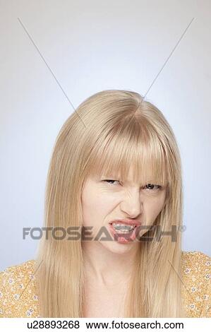 Stock Photo - Portrait of angry woman. Fotosearch