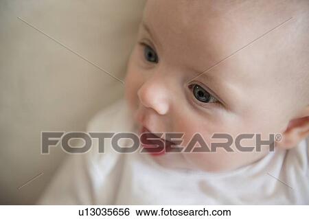 Stock Photograph - Portrait of baby boy (2-5 months). Fotosearch