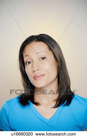 Portrait of content woman View Large Photo Image Stock Image - Portrait of content woman. Fotosearch