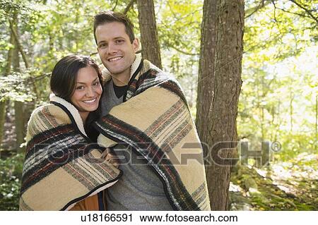 Portrait of couple in forest View Large Photo Image Stock Image - Portrait of couple in forest. Fotosearch
