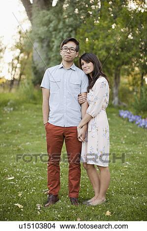 Portrait of couple in park View Large Photo Image Picture - Portrait of couple in park. Fotosearch