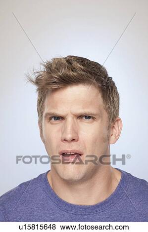 Portrait of displeased man View Large Photo Image Stock Photo - Portrait of displeased man. Fotosearch
