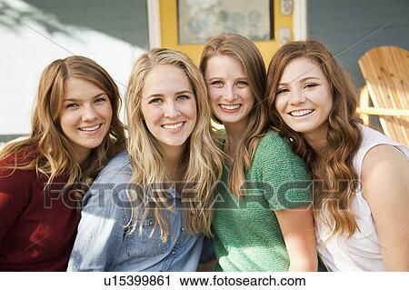 Stock Image - Portrait of four friends. Fotosearch