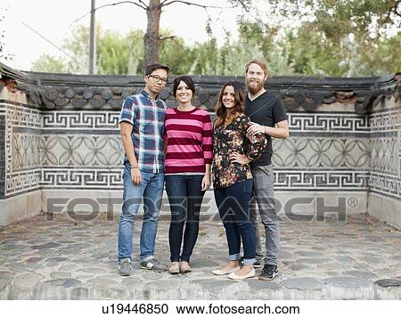 Stock Image - Portrait of group of friends. Fotosearch