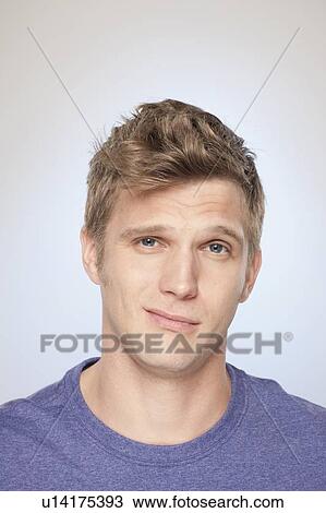 Portrait of man looking uncertain View Large Photo Image Stock Image - Portrait of man looking uncertain. Fotosearch