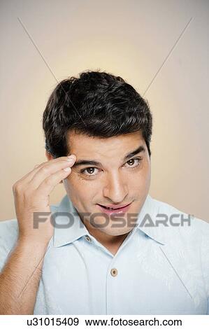 Portrait of man saluting View Large Photo Image Stock Photo - Portrait of man saluting. Fotosearch