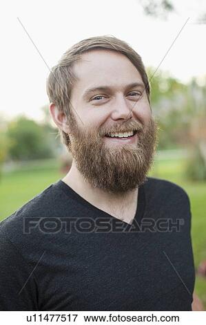 Portrait of man smiling View Large Photo Image Stock Photo - Portrait of man smiling. Fotosearch