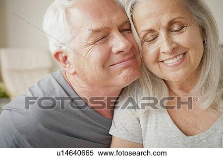 Portrait of senior couple in close embrace View Large Photo Image Stock Photography - Portrait of senior couple in close embrace. Fotosearch